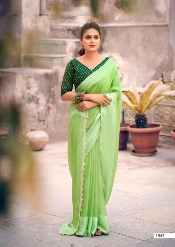 Plain green saree with designer blouse